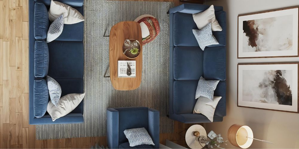 como colocar dos sofás en un salón pequeño